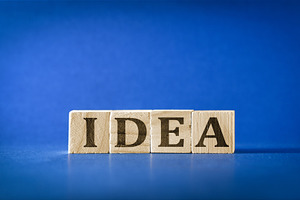 Idea Concept with Wooden Letter Blocks, a Business Photo by Davizro's Market
