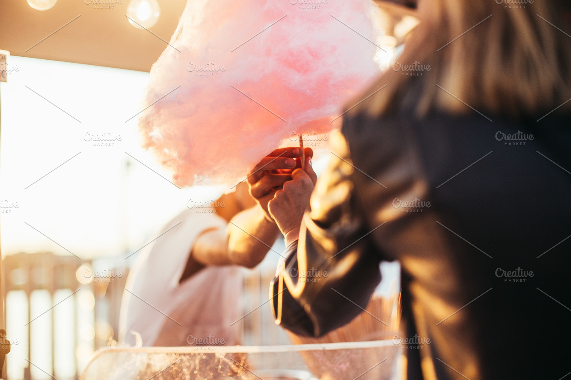 Pretty woman with cotton candy featuring child, party, and food, a Holiday Photo by DeRepente