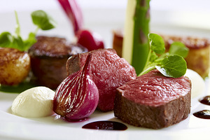 Gourmet beef fillet steak with roasted red onion, asparagus, potatoes, and rich, a Photo by Studio ANNA