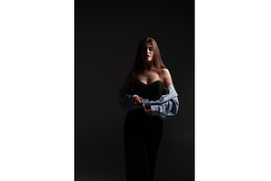 Young woman posing gracefully in a, a Person Photo by volodymyrshtun13795