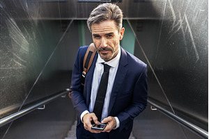 Determined businessman with, a Person Photo by nunezimage