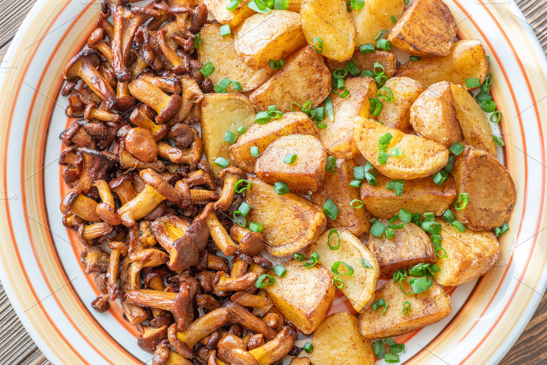 Fried potatoes chanterelle mushrooms, a Food & Drink Photo by Alexander Prokopenko