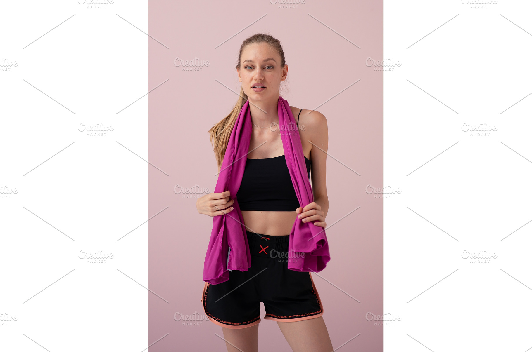 Sporty young woman standing with a, a Sports & Recreation Photo by undrey