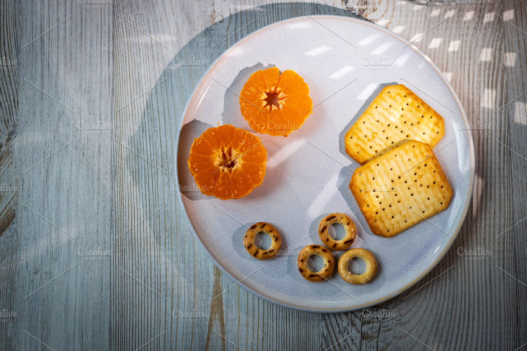 Top-down view of a plate with tanger, a Food & Drink Photo by Imaginarium