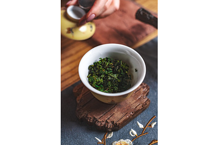 Preparing tea with fresh green, a Food & Drink Photo by Media Whale Stock