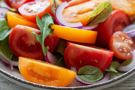 Green salad from leaves and tomatoes, a Food & Drink Photo by Olena Rudo