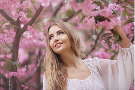 Woman at Blossoming Sakura Tree on, a Beauty & Fashion Photo by Emotion photo