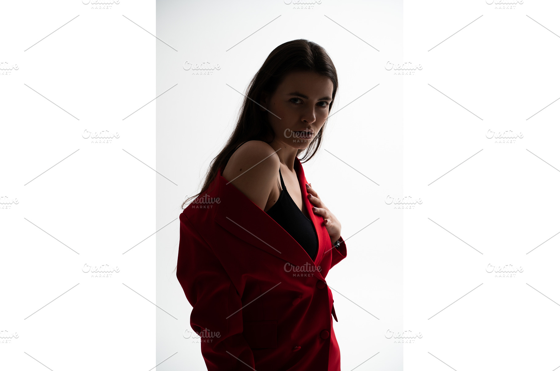 Confident young woman posing with a, a Person Photo by volodymyrshtun13795