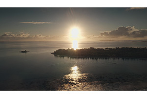 Stunning sunset over calm waters and, a Nature Photo by Goinyk