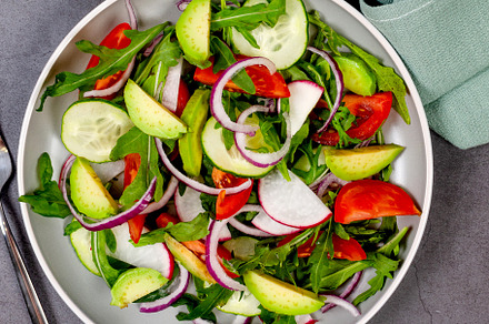 green salad with arugula, tomatoes, cucumber and avocado., a Food & Drink Photo by vimart