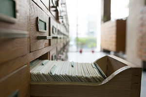 Drawers in archive featuring old, wooden, and archive