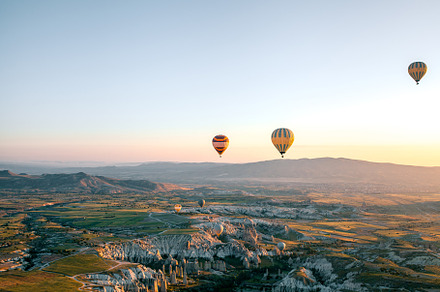 Hot air balloons over the valley featuring cappadocia, balloon, and air