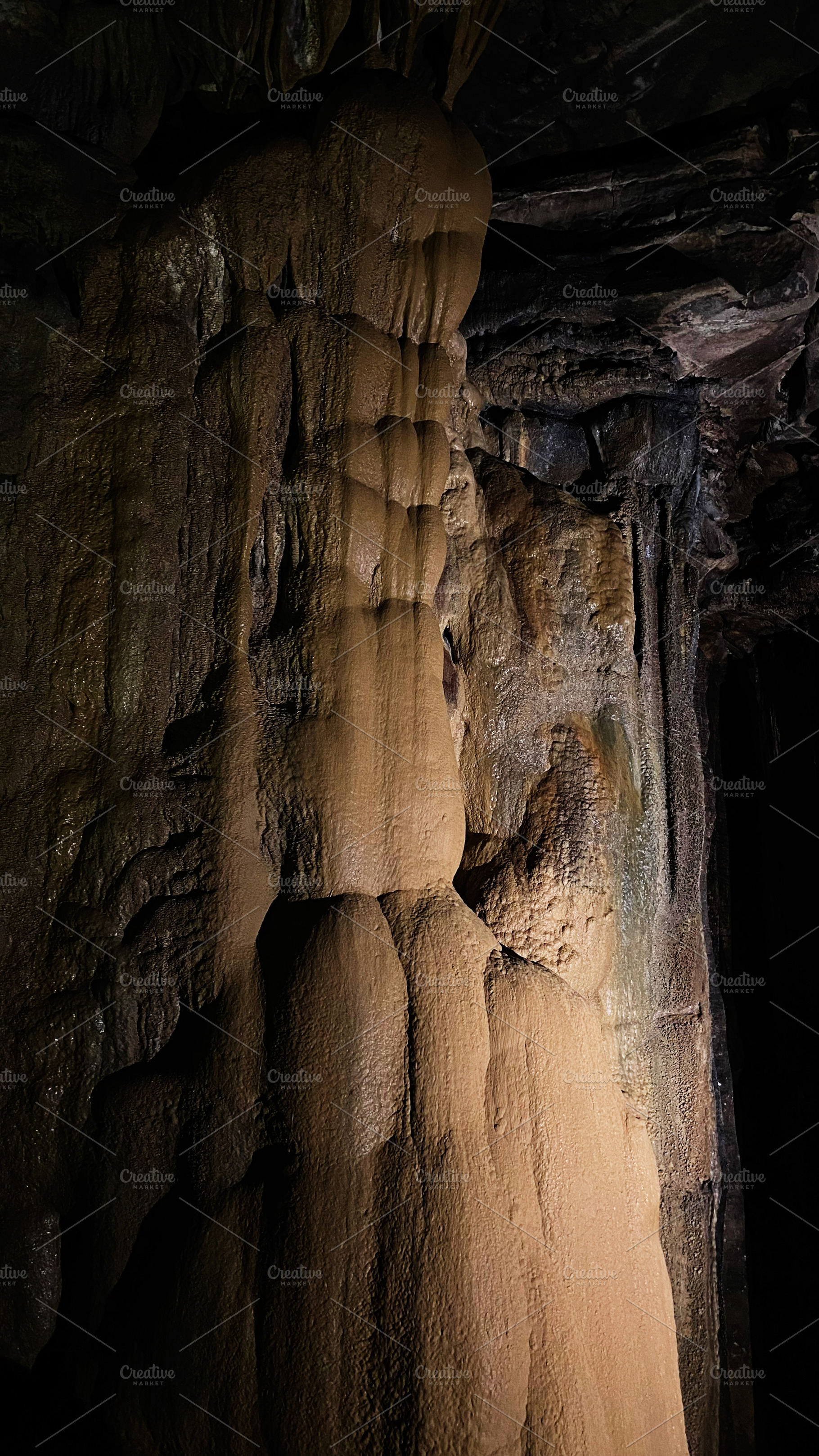 Inside Mammoth Cave in Kentucky, dramatic stalactites and stalagmites form mine, a Nature Photo by AS photostudio