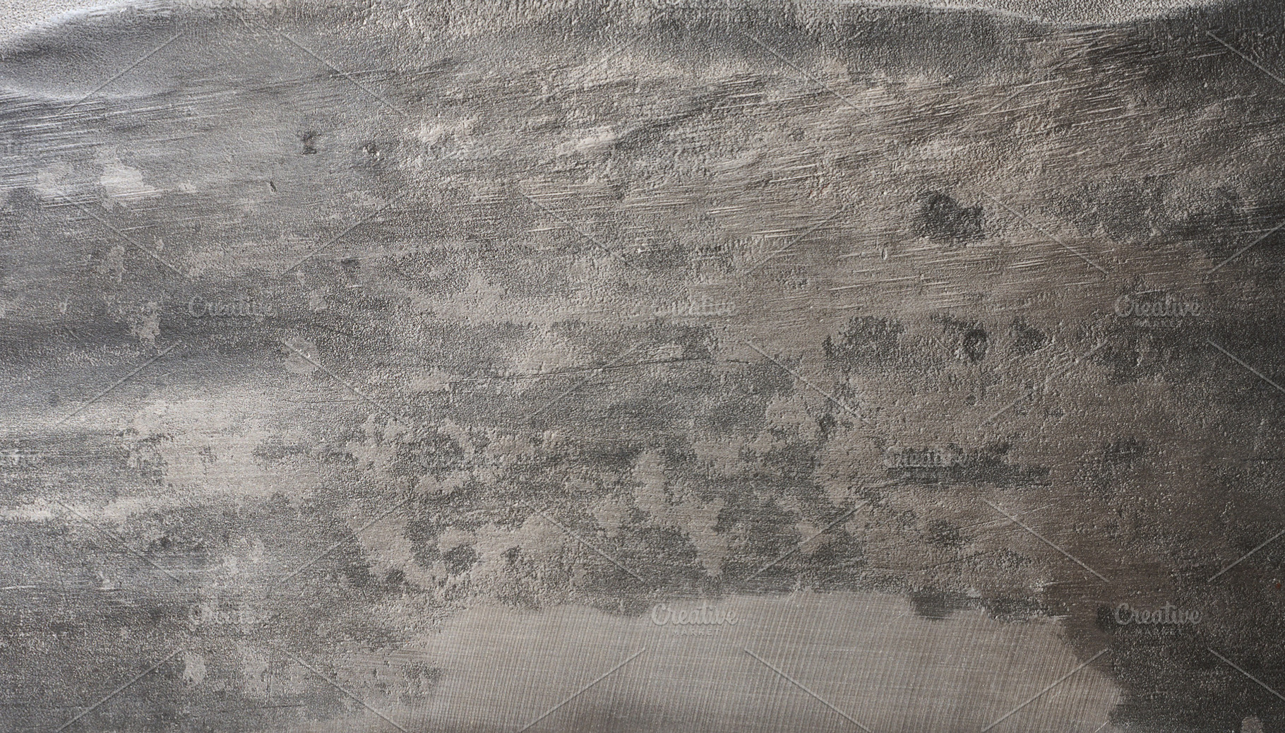 Close up of a worn and scratched metal surface with dark and lig, a Background Photo by ndanko