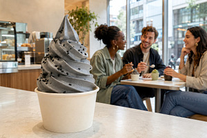 Black sesame ice cream on table in c, a Photo by Dvoevnore photos