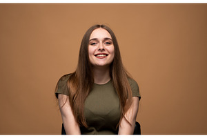 Young woman smiling, showing, a Person Photo by volodymyrshtun13795