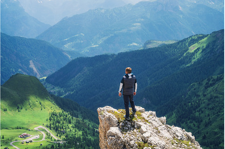 Mountain landscape with a hiker, a Nature Photo by den-belitsky