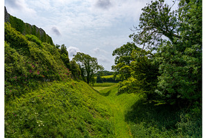Moat underneath the walls of, an Architecture Photo by Backyard Stock