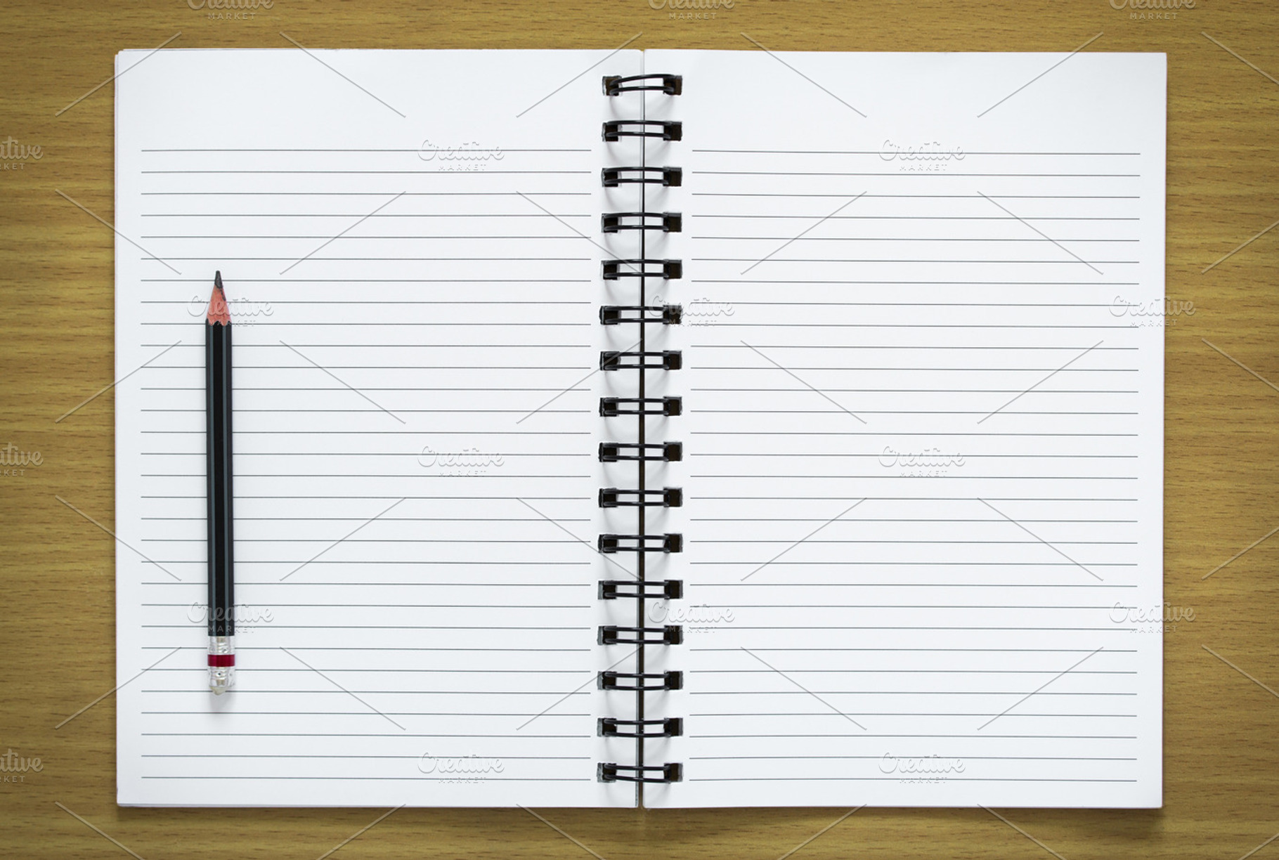 Blank spiral notebook and pencil featuring notebook, paper, and spiral, an Arts & Entertainment Photo by aopsan
