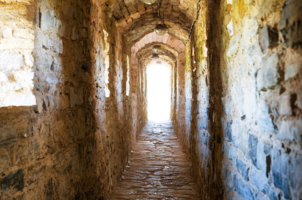 Dark corridor in dungeon stock photo containing dungeon and tunnel, an Architecture Photo by Vapi