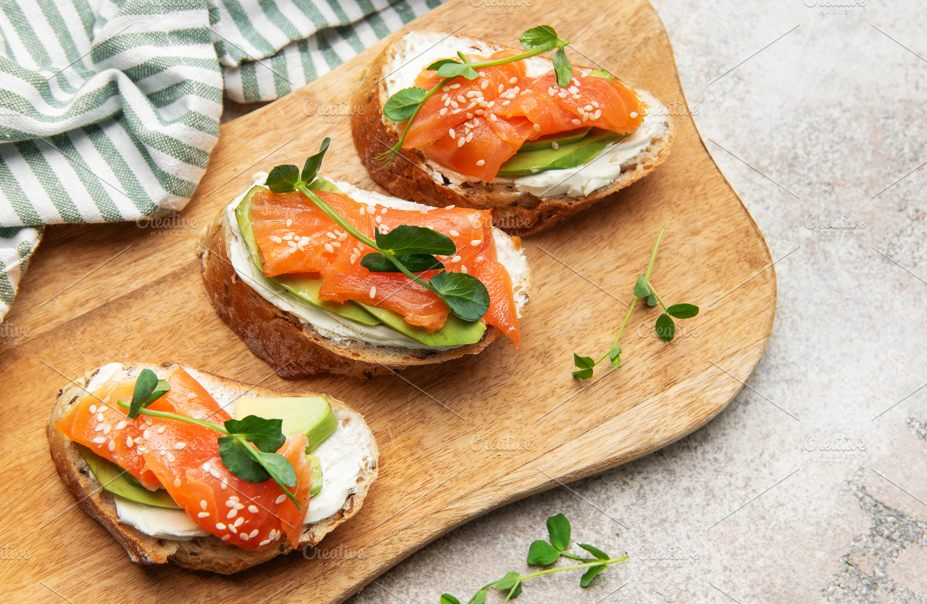 Smoked salmon toast with avocado and cream cheese, a Food & Drink Photo by Olena Rudo