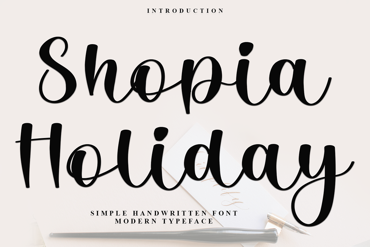Shopia Holiday, a Handwritten Font by InermediaSTUDIO (Photo 1 of 7)