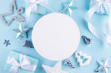 Christmas blue background. Holidays gift box wrapped in blue pap, a Holiday Photo by vimart