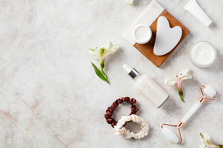 Face skin care concept. Flat lay face roller, gua sha, serum, moisturizer cream, a Beauty & Fashion Photo by photoguns