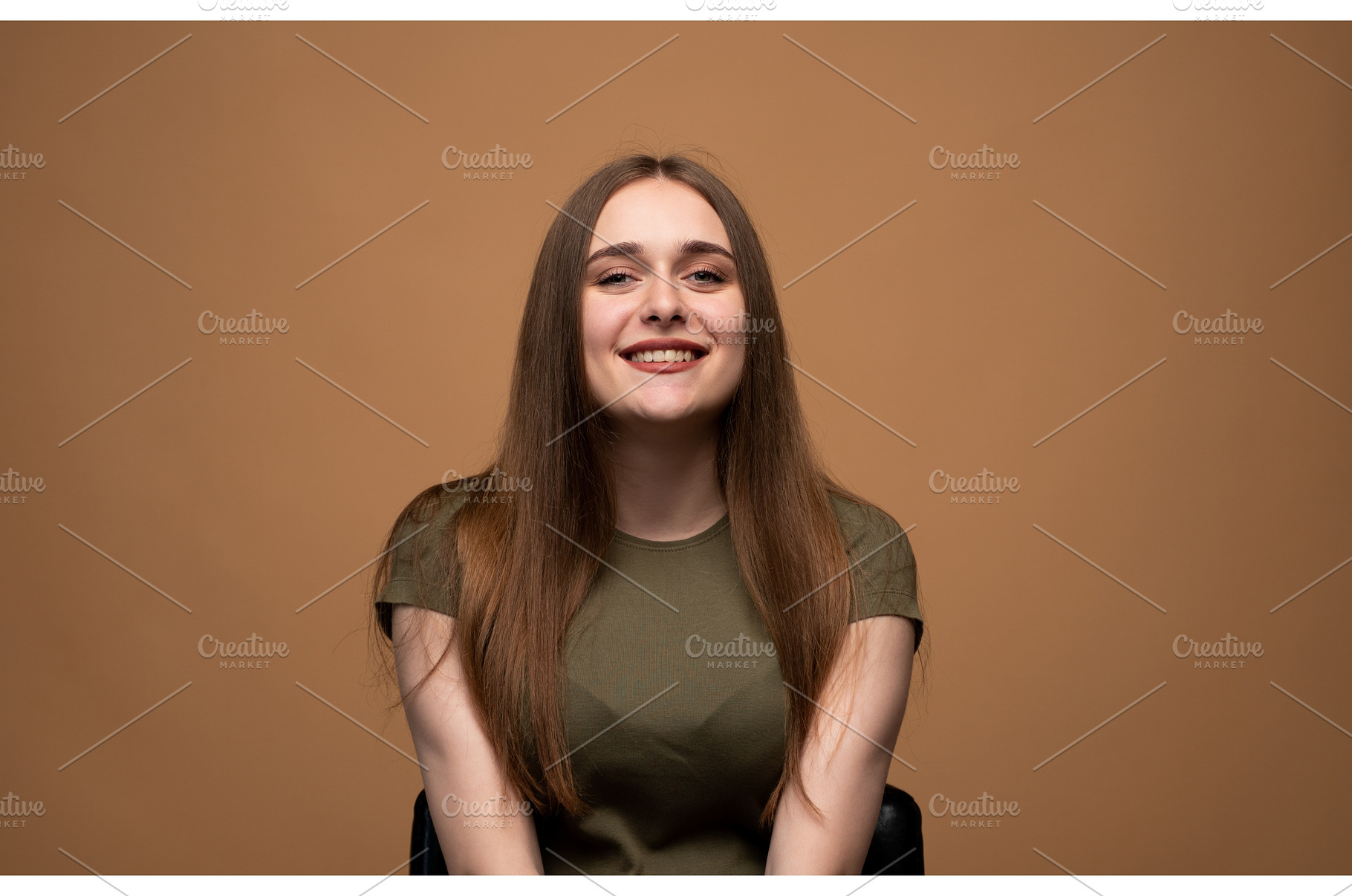 Young woman smiling portrait looking, a Person Photo by volodymyrshtun13795