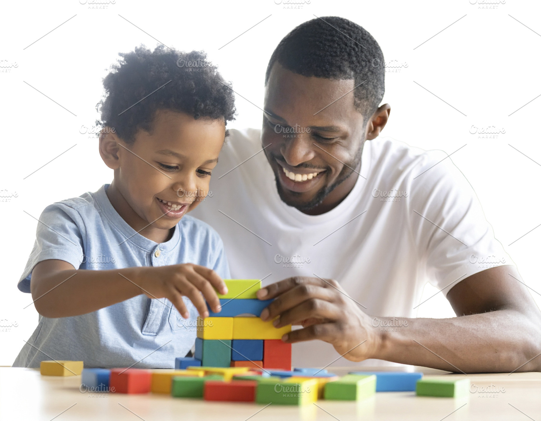 Child and father building with blocks isolated photo, a School & Education Photo by DanFLCreativo
