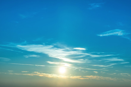 Sunset in the sky containing sky, sun, and blue, a Nature Photo by Vapi