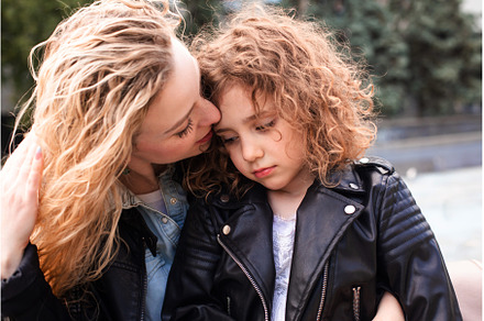 Mom and daughter are whispering, a Person Photo by oksix