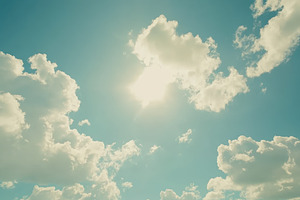 Cumulus clouds drifting across a bri, a Photo by Iftikhar Alam