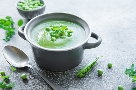 Fresh vegetable soup made of green peas, a Food & Drink Photo by Olena Rudo