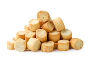 Pile of crispy croutons close-up on