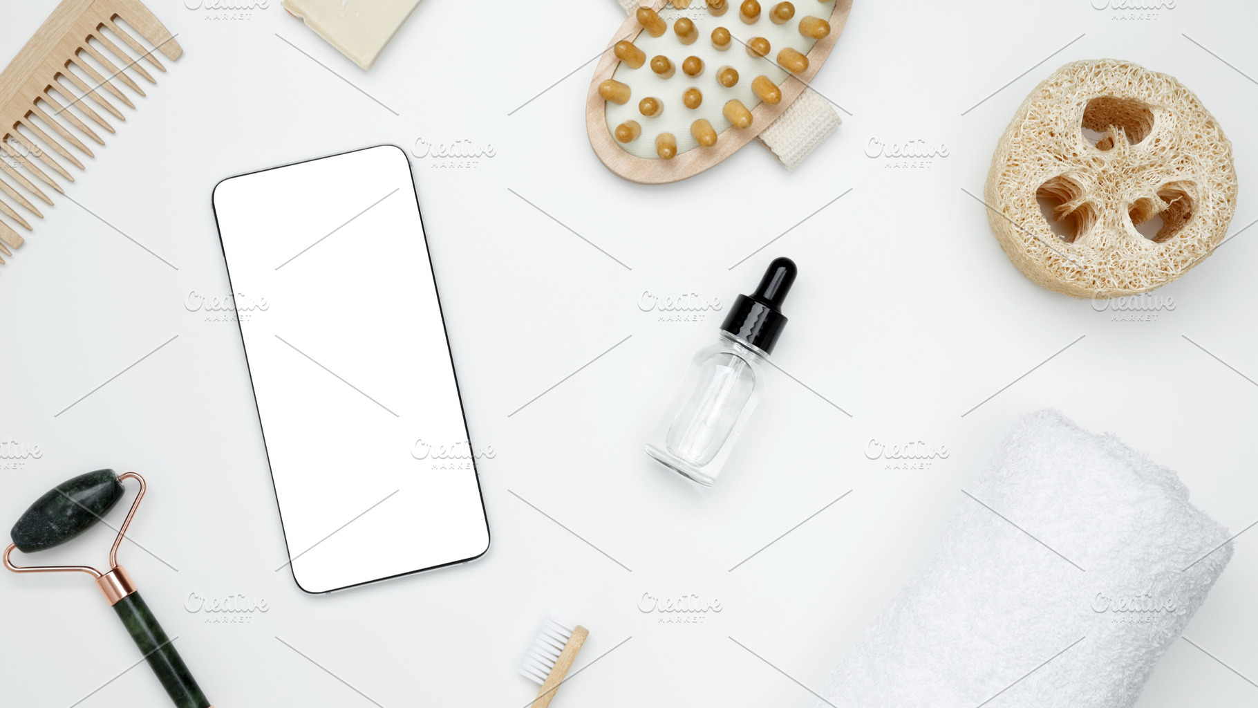 Smartphone with blank white screen surrounded by natural skincare and self-care, a Photo by matucha