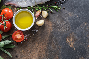 Raw dorado fish with spices and vege, a Food & Drink Photo by Volff