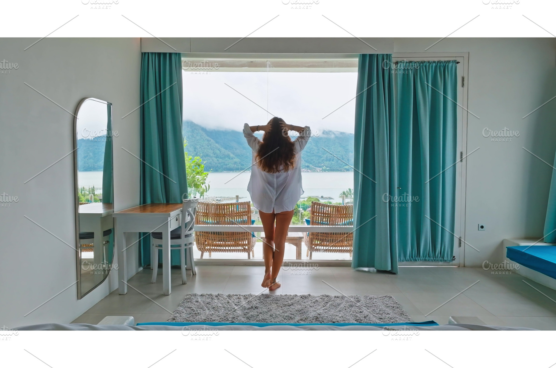 Woman enjoying morning lake view, a Person Photo by Goinyk