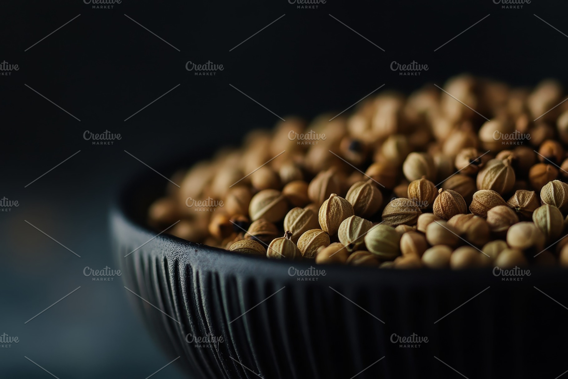 Close up of coriander seeds in a bla, a Photo by Iftikhar Alam