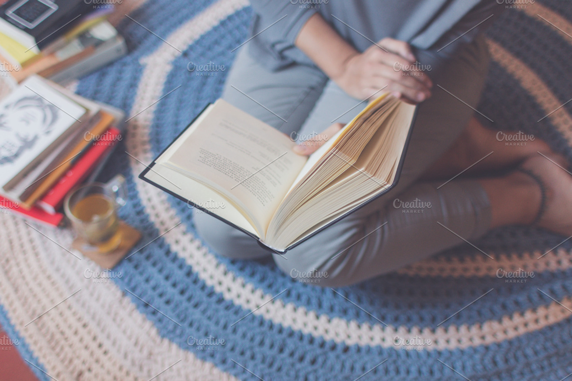 Interesting reading, a Person Photo by Tan Tranquila
