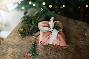 Merry Christmas! Stylish christmas present wrapped in fabric wit, a Holiday Photo by Sonjachni