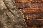 Rustic burlap on a wooden table, a Texture Graphic by Max Lashcheuski (Thumbnail 2 of 12)
