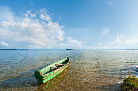 Old wooden fishing boat on summer lake bank (Svityaz, Ukraine), a Nature Photo by YuriyB