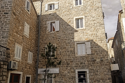 Beautiful stone square with narrow s, an Architecture Photo by Photo by YuraYaryna