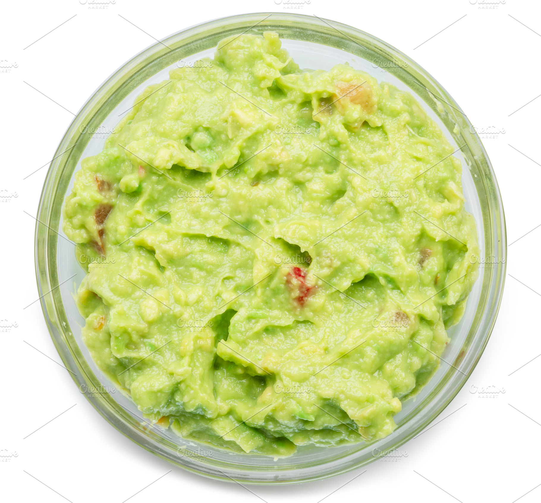 Glass bowl of guacamole on white background. File contains clipp, a Food & Drink Photo by Volff