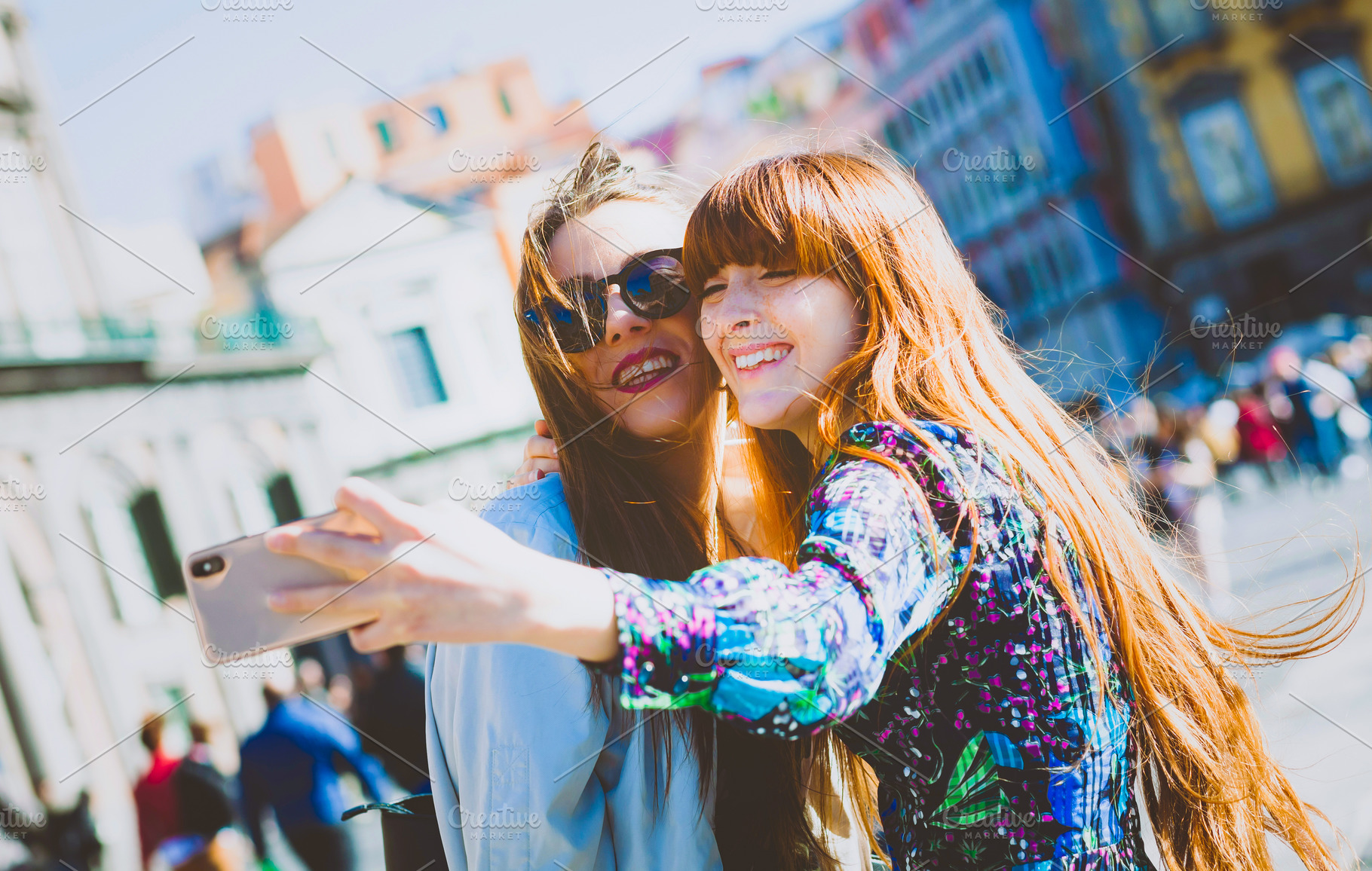 Two smiling tourists taking selfie in Genoa, Italy, a Person Photo by Antonio Gravante Market