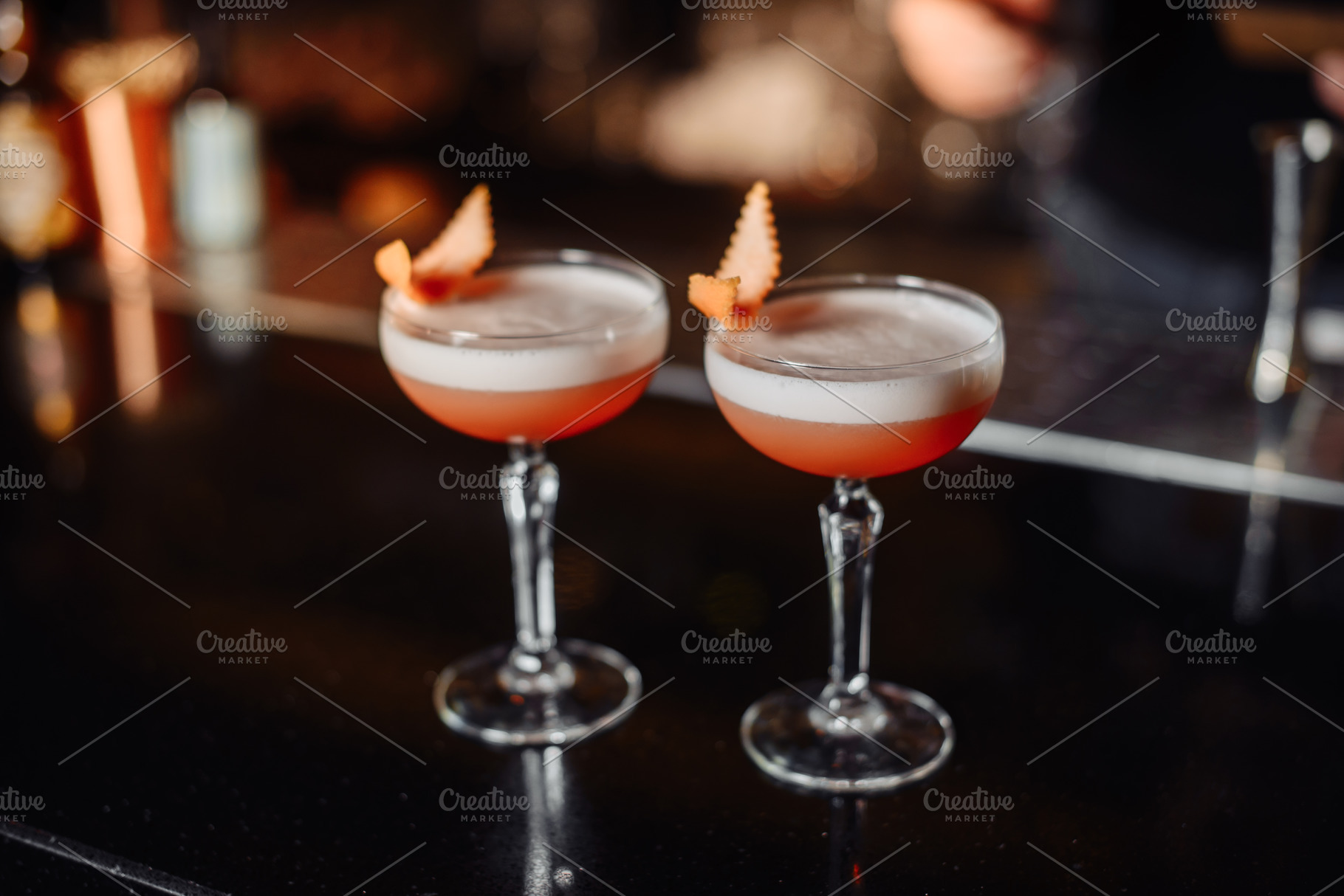 Two orange cocktails stock photo containing alcohol and bar, a Food & Drink Photo by Rov.7