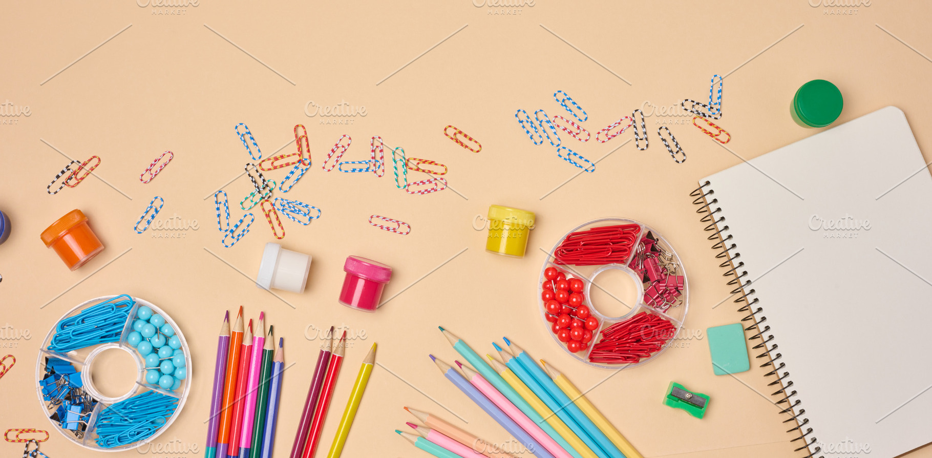 Flat lay of colorful school and office supplies including pencil, a School & Education Photo by ndanko