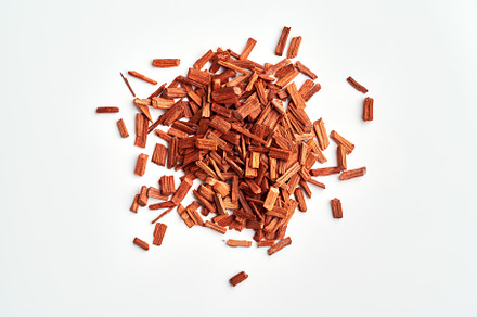 Red sandalwood chips on white background, top view, a Food & Drink Photo by Madeleine Steinbach
