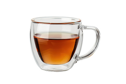 Glass cup of aromatic tea isolated on white background, a Food & Drink Photo by AlyaAnd